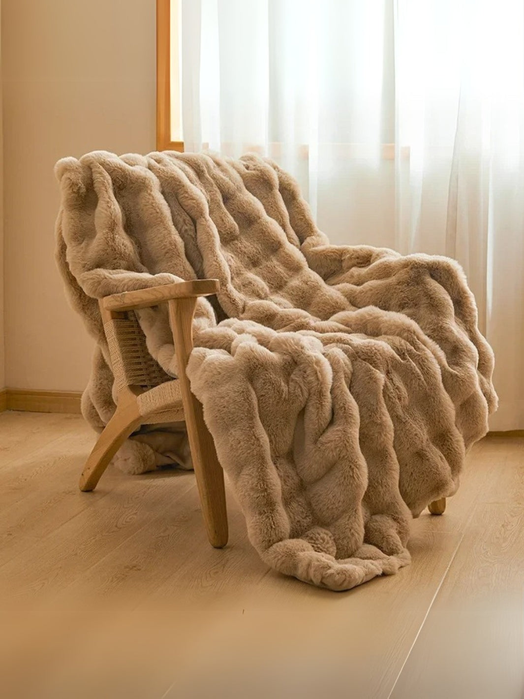 Jeté de canapé en fausse fourrure