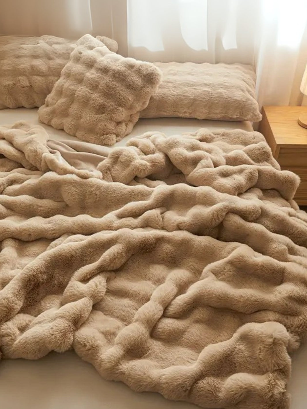 Jeté de canapé en fausse fourrure